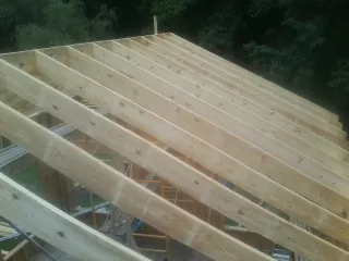 New roof rafters set over an addition before sheathing in Yellow Spring